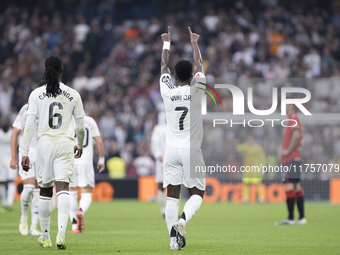 Vinicius Jr of Real Madrid celebrates a goal during the La Liga 2024/25 match between Real Madrid and Osasuna at Santiago Bernabeu Stadium i...