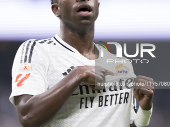 Vinicius Jr of Real Madrid celebrates a goal during the La Liga 2024/25 match between Real Madrid and Osasuna at Santiago Bernabeu Stadium i...