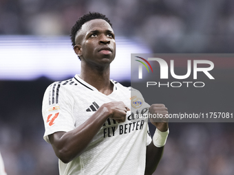 Vinicius Jr of Real Madrid celebrates a goal during the La Liga 2024/25 match between Real Madrid and Osasuna at Santiago Bernabeu Stadium i...