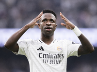 Vinicius Jr of Real Madrid celebrates a goal during the La Liga 2024/25 match between Real Madrid and Osasuna at Santiago Bernabeu Stadium i...