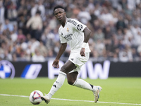 Vinicius Jr of Real Madrid scores a goal during the La Liga 2024/25 match between Real Madrid and Osasuna at Santiago Bernabeu Stadium in Ma...