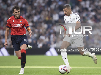 Kylian Mbappe of Real Madrid plays during the La Liga 2024/25 match between Real Madrid and Osasuna at Santiago Bernabeu Stadium in Madrid,...