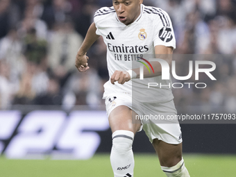 Kylian Mbappe of Real Madrid plays during the La Liga 2024/25 match between Real Madrid and Osasuna at Santiago Bernabeu Stadium in Madrid,...