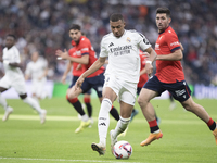 Kylian Mbappe of Real Madrid plays during the La Liga 2024/25 match between Real Madrid and Osasuna at Santiago Bernabeu Stadium in Madrid,...