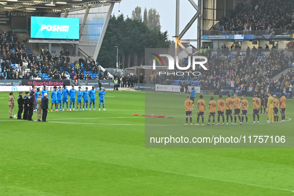 A minute of silence takes place before the Sky Bet League 1 match between Peterborough and Cambridge United at London Road in Peterborough,...