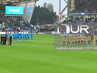 A minute of silence takes place before the Sky Bet League 1 match between Peterborough and Cambridge United at London Road in Peterborough,...