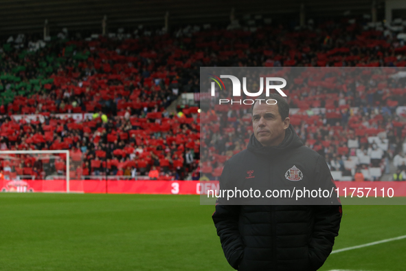 Sunderland Head Coach Regis Le Bris stands in front of a poppy display during the Sky Bet Championship match between Sunderland and Coventry...