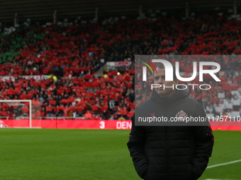 Sunderland Head Coach Regis Le Bris stands in front of a poppy display during the Sky Bet Championship match between Sunderland and Coventry...