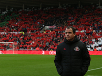 Sunderland Head Coach Regis Le Bris stands in front of a poppy display during the Sky Bet Championship match between Sunderland and Coventry...