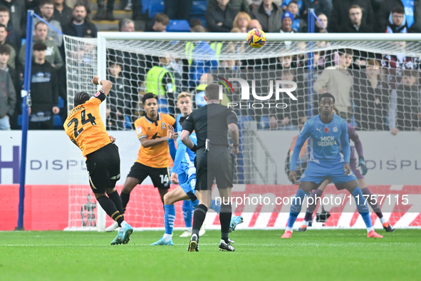 Jordan Cousins (24 Cambridge United) shoots over the bar early on during the Sky Bet League 1 match between Peterborough and Cambridge Unite...