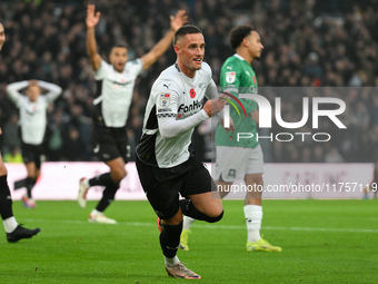 Jerry Yates of Derby County celebrates after scoring a goal to make it 1-0 during the Sky Bet Championship match between Derby County and Pl...