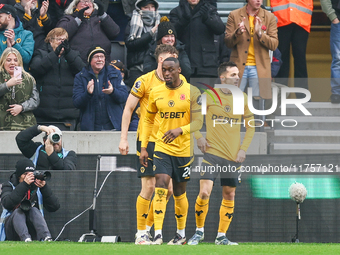 Pablo Sarabia of Wolves (right) with teammates following his goal during the Premier League match between Wolverhampton Wanderers and Southa...