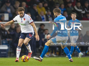 Dion Charles #10 of Bolton Wanderers F.C. is in action during the Sky Bet League 1 match between Stockport County and Bolton Wanderers at th...