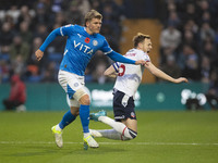 George Johnston #6 of Bolton Wanderers F.C. is fouled by the opponent during the Sky Bet League 1 match between Stockport County and Bolton...