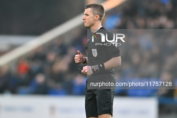 Referee Edward Duckworth observes during the Sky Bet League 1 match between Peterborough and Cambridge United at London Road in Peterborough...