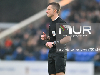 Referee Edward Duckworth observes during the Sky Bet League 1 match between Peterborough and Cambridge United at London Road in Peterborough...