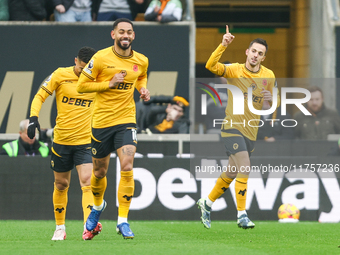 Pablo Sarabia of Wolves raises his hand in celebration following his goal during the Premier League match between Wolverhampton Wanderers an...