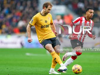 Craig Dawson of Wolves is in defensive action during the Premier League match between Wolverhampton Wanderers and Southampton at Molineux in...