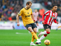 Craig Dawson of Wolves is in defensive action during the Premier League match between Wolverhampton Wanderers and Southampton at Molineux in...