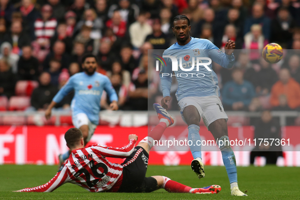 Sunderland's Chris Mepham tackles Coventry City's Haji Wright during the Sky Bet Championship match between Sunderland and Coventry City at...