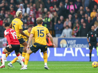 Midfield action occurs during the Premier League match between Wolverhampton Wanderers and Southampton at Molineux in Wolverhampton, England...