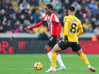 Kyle Walker-Peters of Southampton and Joao Gomes of Wolves are in action during the Premier League match between Wolverhampton Wanderers and...