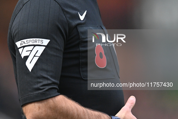 Close-up of poppy and EA Sports logo during the Sky Bet League 1 match between Peterborough and Cambridge United at London Road in Peterboro...