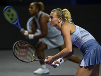 RIYADH, SAUDI ARABIA - NOVEMBER 09: Katerina Siniakova (R) of the Czech Republic and Taylor Townsend of the USA during the Final match again...