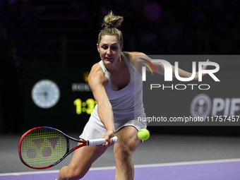 RIYADH, SAUDI ARABIA - NOVEMBER 09: Gabriela Dabrowski of Canada playing with Erin Routliffe of New Zealand during the Final match against K...