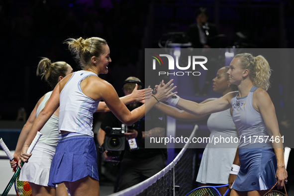 RIYADH, SAUDI ARABIA - NOVEMBER 09: Gabriela Dabrowski (1L) of Canada and Erin Routliffe (2L) of New Zealand receives congratulations from K...