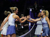 RIYADH, SAUDI ARABIA - NOVEMBER 09: Gabriela Dabrowski (1L) of Canada and Erin Routliffe (2L) of New Zealand receives congratulations from K...