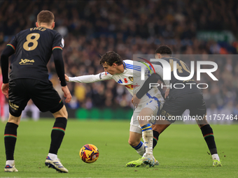 Brenden Aaronson (Leeds United) is fouled by Jonathan Varane (QPR) during the Sky Bet Championship match between Leeds United and Queens Par...