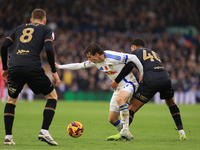 Brenden Aaronson (Leeds United) is fouled by Jonathan Varane (QPR) during the Sky Bet Championship match between Leeds United and Queens Par...