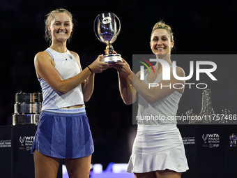 RIYADH, SAUDI ARABIA - NOVEMBER 09: Gabriela Dabrowski (R) of Canada and Erin Routliffe (L) of New Zealand with the Trophy at the Awards Cer...