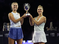 RIYADH, SAUDI ARABIA - NOVEMBER 09: Gabriela Dabrowski (R) of Canada and Erin Routliffe (L) of New Zealand with the Trophy at the Awards Cer...