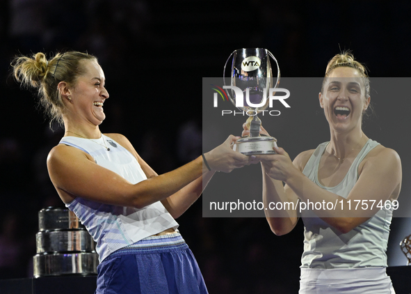 RIYADH, SAUDI ARABIA - NOVEMBER 09: Gabriela Dabrowski (R) of Canada and Erin Routliffe (L) of New Zealand with the Trophy at the Awards Cer...