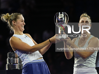 RIYADH, SAUDI ARABIA - NOVEMBER 09: Gabriela Dabrowski (R) of Canada and Erin Routliffe (L) of New Zealand with the Trophy at the Awards Cer...