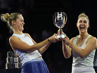 RIYADH, SAUDI ARABIA - NOVEMBER 09: Gabriela Dabrowski (R) of Canada and Erin Routliffe (L) of New Zealand with the Trophy at the Awards Cer...