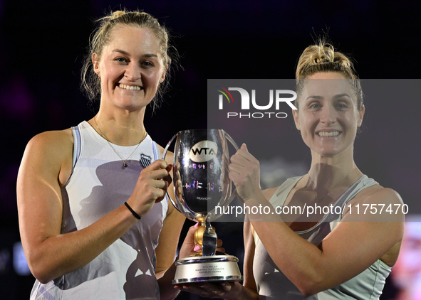 RIYADH, SAUDI ARABIA - NOVEMBER 09: Gabriela Dabrowski (R) of Canada and Erin Routliffe (L) of New Zealand with the Trophy at the Awards Cer...