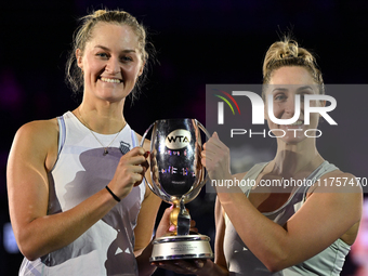 RIYADH, SAUDI ARABIA - NOVEMBER 09: Gabriela Dabrowski (R) of Canada and Erin Routliffe (L) of New Zealand with the Trophy at the Awards Cer...