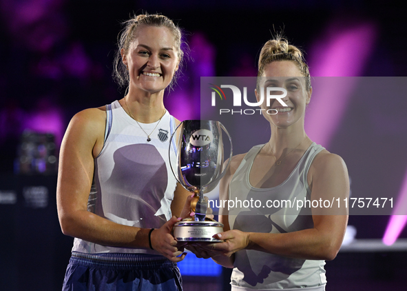 RIYADH, SAUDI ARABIA - NOVEMBER 09: Gabriela Dabrowski (R) of Canada and Erin Routliffe (L) of New Zealand with the Trophy at the Awards Cer...