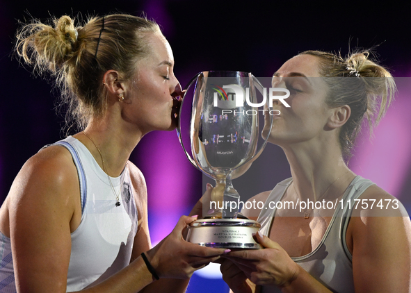 RIYADH, SAUDI ARABIA - NOVEMBER 09: Gabriela Dabrowski (R) of Canada and Erin Routliffe (L) of New Zealand with the Trophy at the Awards Cer...