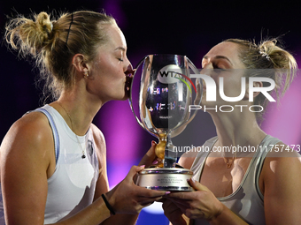 RIYADH, SAUDI ARABIA - NOVEMBER 09: Gabriela Dabrowski (R) of Canada and Erin Routliffe (L) of New Zealand with the Trophy at the Awards Cer...