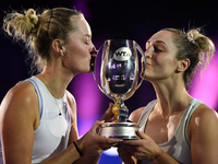 RIYADH, SAUDI ARABIA - NOVEMBER 09: Gabriela Dabrowski (R) of Canada and Erin Routliffe (L) of New Zealand with the Trophy at the Awards Cer...