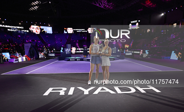 RIYADH, SAUDI ARABIA - NOVEMBER 09: Gabriela Dabrowski (R) of Canada and Erin Routliffe (L) of New Zealand with the Trophy at the Awards Cer...