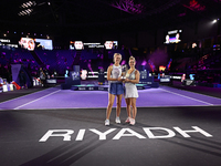 RIYADH, SAUDI ARABIA - NOVEMBER 09: Gabriela Dabrowski (R) of Canada and Erin Routliffe (L) of New Zealand with the Trophy at the Awards Cer...