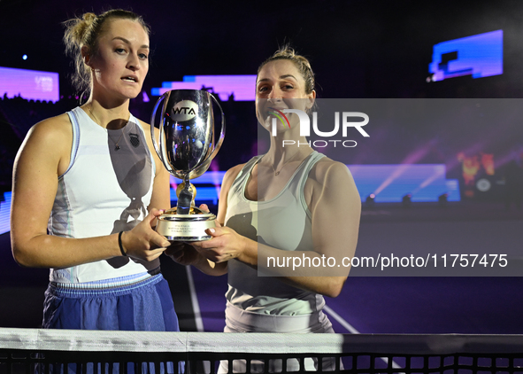 RIYADH, SAUDI ARABIA - NOVEMBER 09: Gabriela Dabrowski (R) of Canada and Erin Routliffe (L) of New Zealand with the Trophy at the Awards Cer...