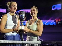 RIYADH, SAUDI ARABIA - NOVEMBER 09: Gabriela Dabrowski (R) of Canada and Erin Routliffe (L) of New Zealand with the Trophy at the Awards Cer...