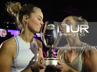 RIYADH, SAUDI ARABIA - NOVEMBER 09: Gabriela Dabrowski (R) of Canada and Erin Routliffe (L) of New Zealand with the Trophy at the Awards Cer...