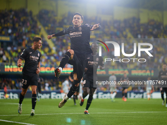 Ilias Akhomach of Villarreal CF celebrates after scoring the team's first goal during the LaLiga EA Sports match between Villarreal CF and D...